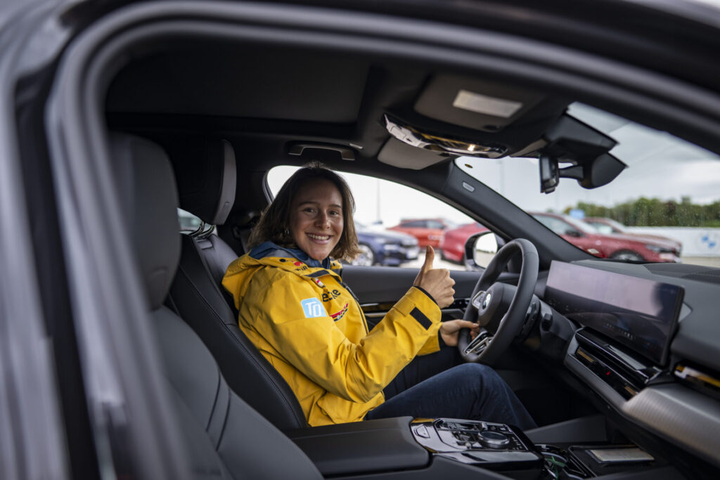 MAISACH, GERMANY - OCTOBER 10: Sophia Schneider of Germany poses for a picture inside of her new BMW 520d xDrive Touring during the BMW Car handover to the German Ski Federation before the Season 2024/25 at the BMW Driving Academy on October 10, 2024 in Maisach near Munich, Germany. (Photo by Kevin Voigt/VOIGT for BMW)